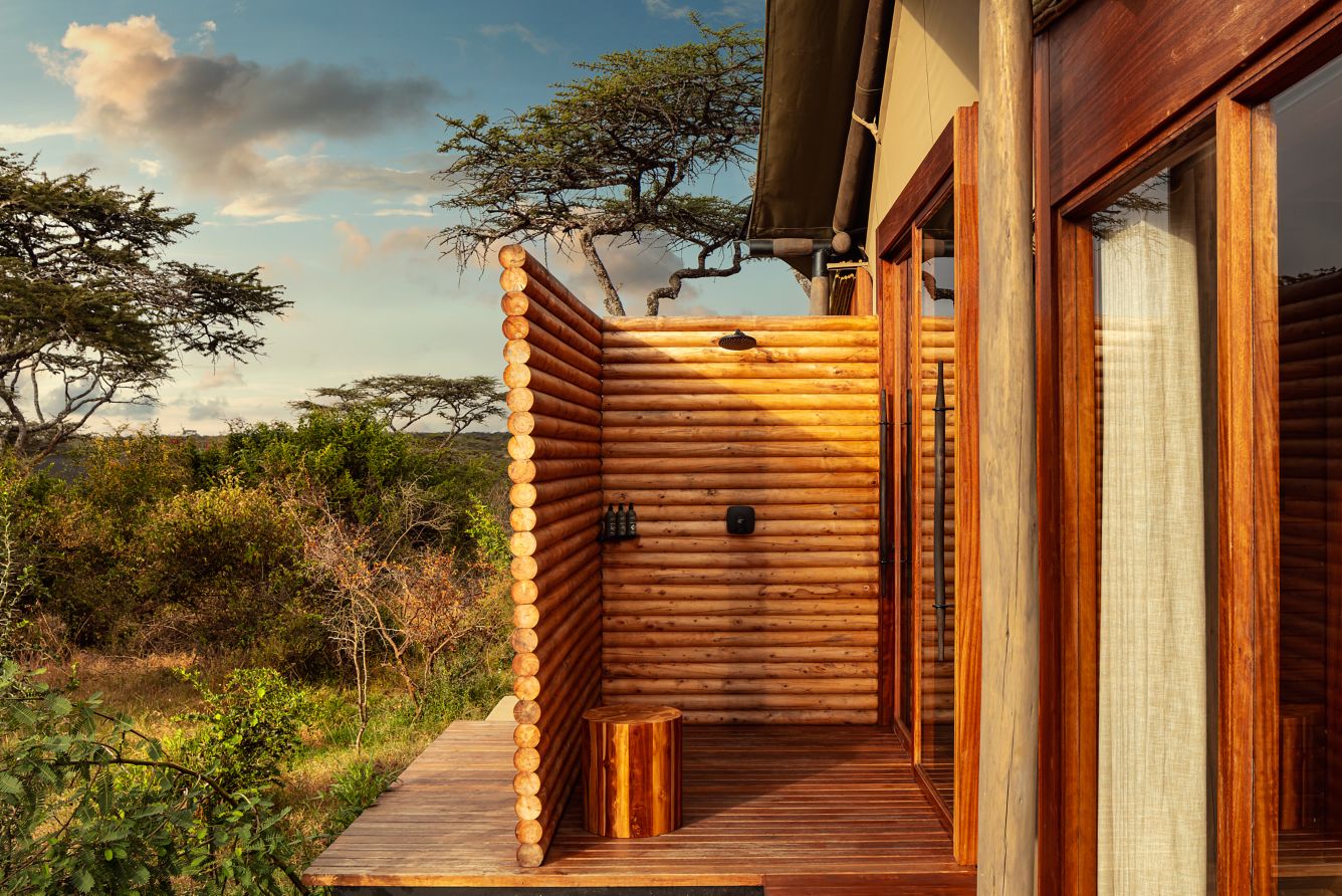 image of the tented suite exterior shower, courtesy of JW Marriott Mount Kenya Rhino Reserve Safari Camp
