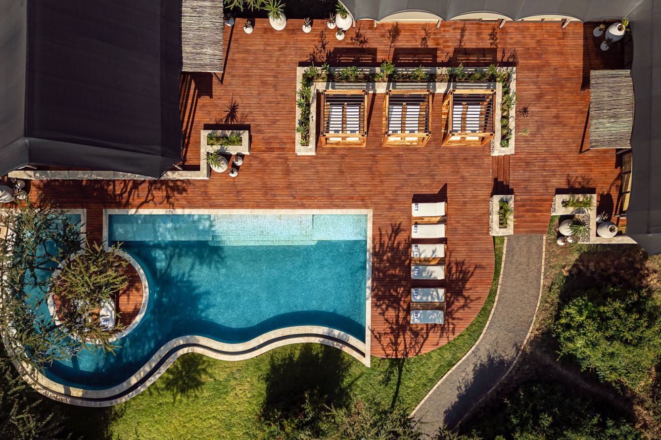 aerial image of the pool deck, courtesy of JW Marriott Mount Kenya Rhino Reserve Safari Camprial2.jpeg