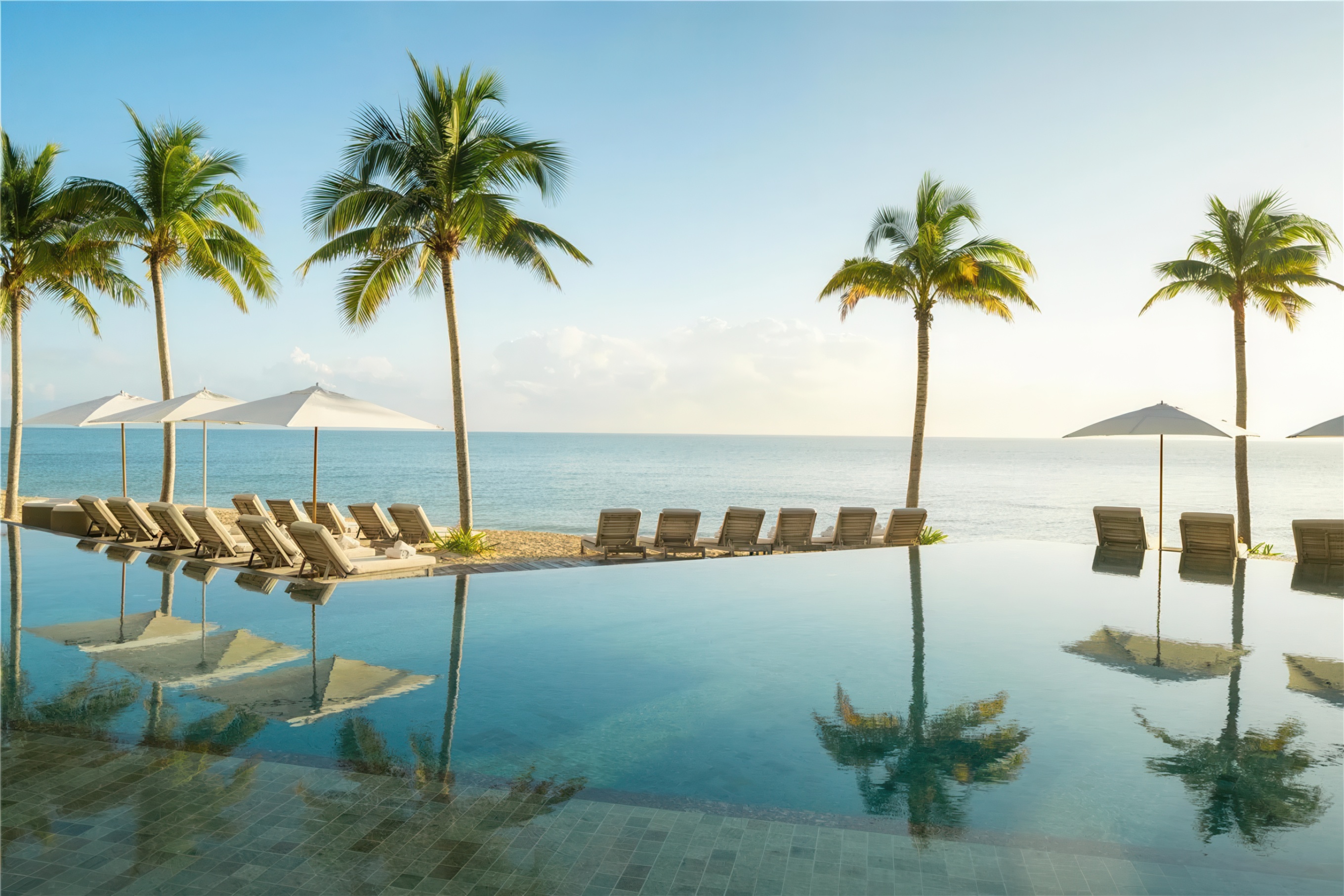 image of the pool view, courtesy of Waldorf Astoria